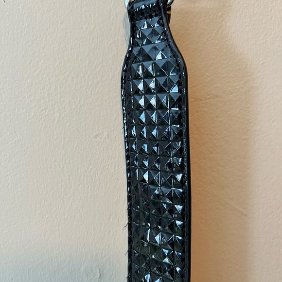 Purse straps. One is 42” long and leopard print, other faux patent leather 32”. - Picture 2 of 8